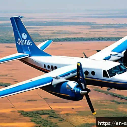 Home 33 남수단 교통편 정보 - A small twin-engine aircraft flying low over the vast South Sudanese landscape during the dry season...